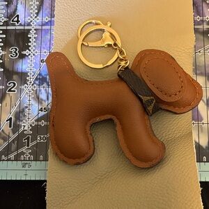 Brown Dog Keychain with upcycled piece of a purse for a collar and Gold Hardware